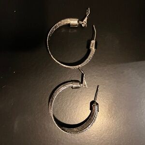 Silver sparkly hoop earring